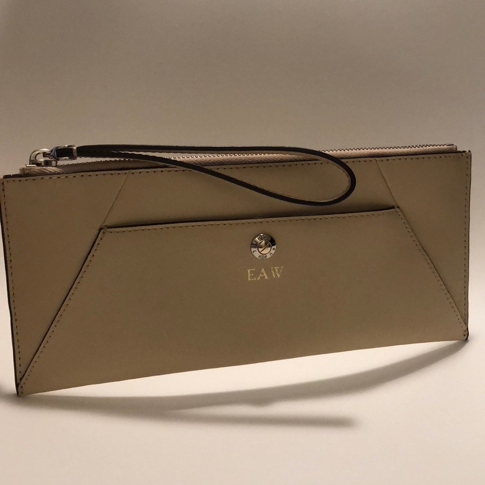 Henri Bendel cream wristlet/clutch